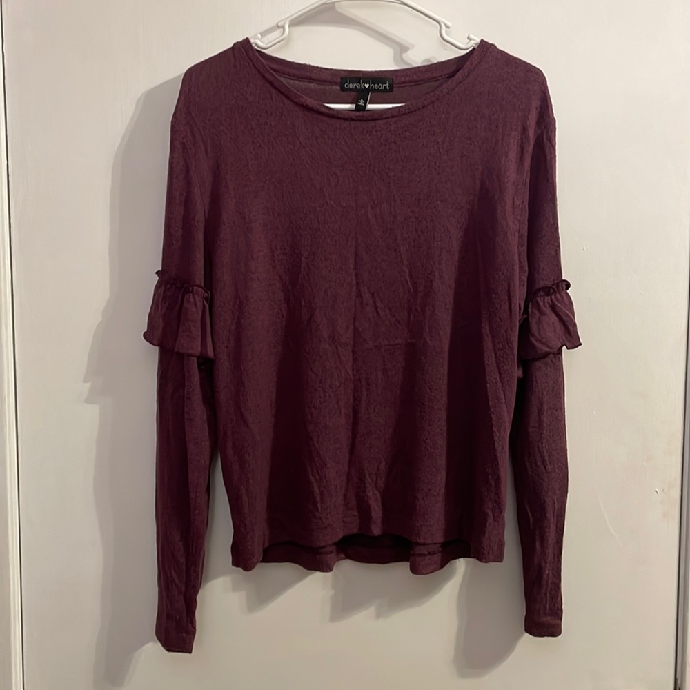 Purple sweater, frilly details